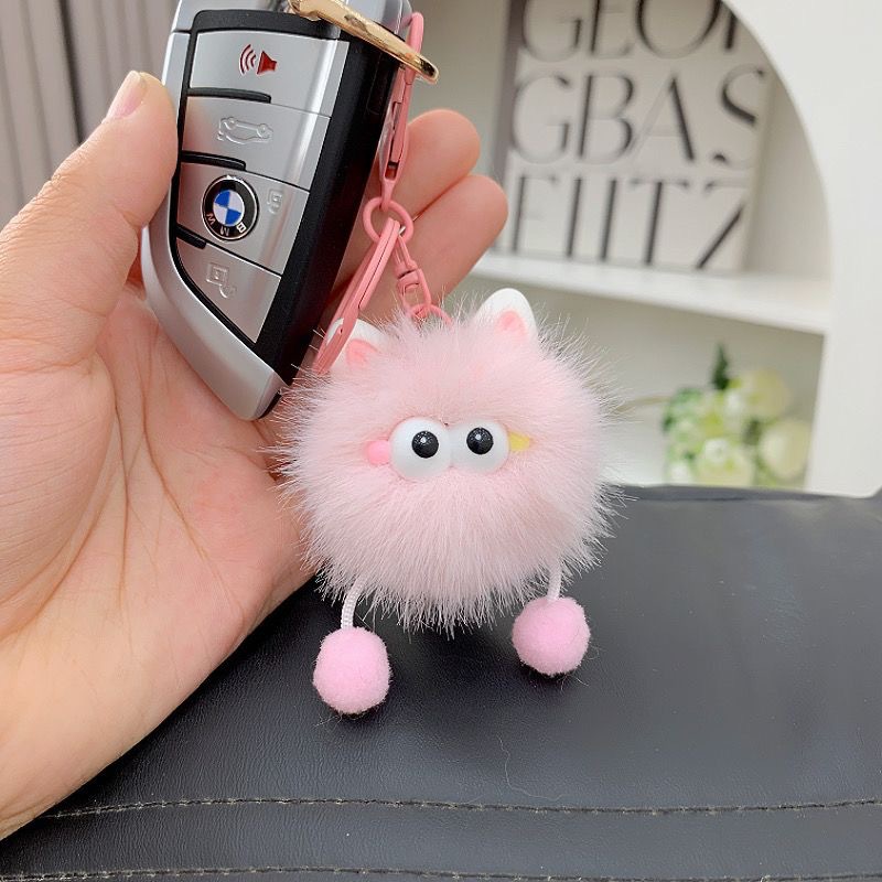 Suministro de nuevos lindos dibujos animados elfos de carbón pequeño colgante de pelusa colgante llavero de automóvil bolso colgante