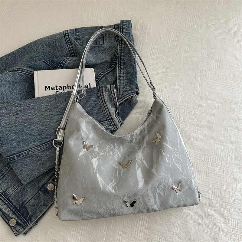 Mochila de viajes de gran capacidad para mujeres 2024 nueva moda mariposa brazo bolso de hombro bolso de cadena universal