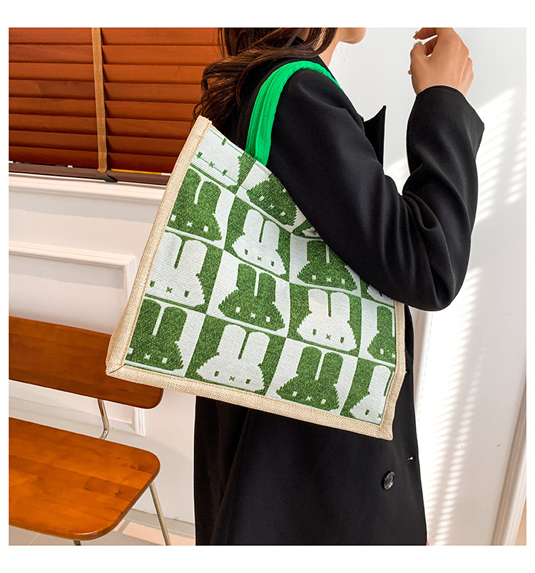 High-end mid-capacity canvas school commuting handbag 2024 new style fashionable and versatile linen single-shoulder tote bag undefined