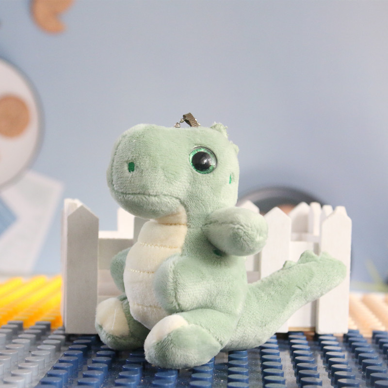Pequeño dinosaurio muñeca de peluche llavero mochila colgante lindo Tyrannosaurus muñeca pareja mochila accesorios colgantes moda