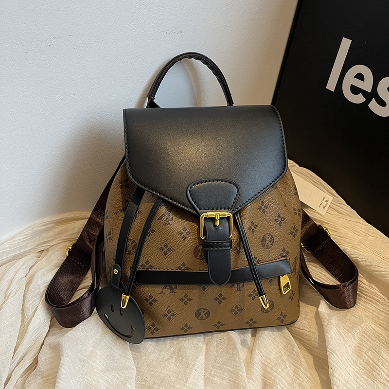 Mochila retro para mujer, mochila de color de contraste de gran capacidad para todo fósforo 2024 nuevo bolso de mujer estampado de alto valor de moda europea y americana