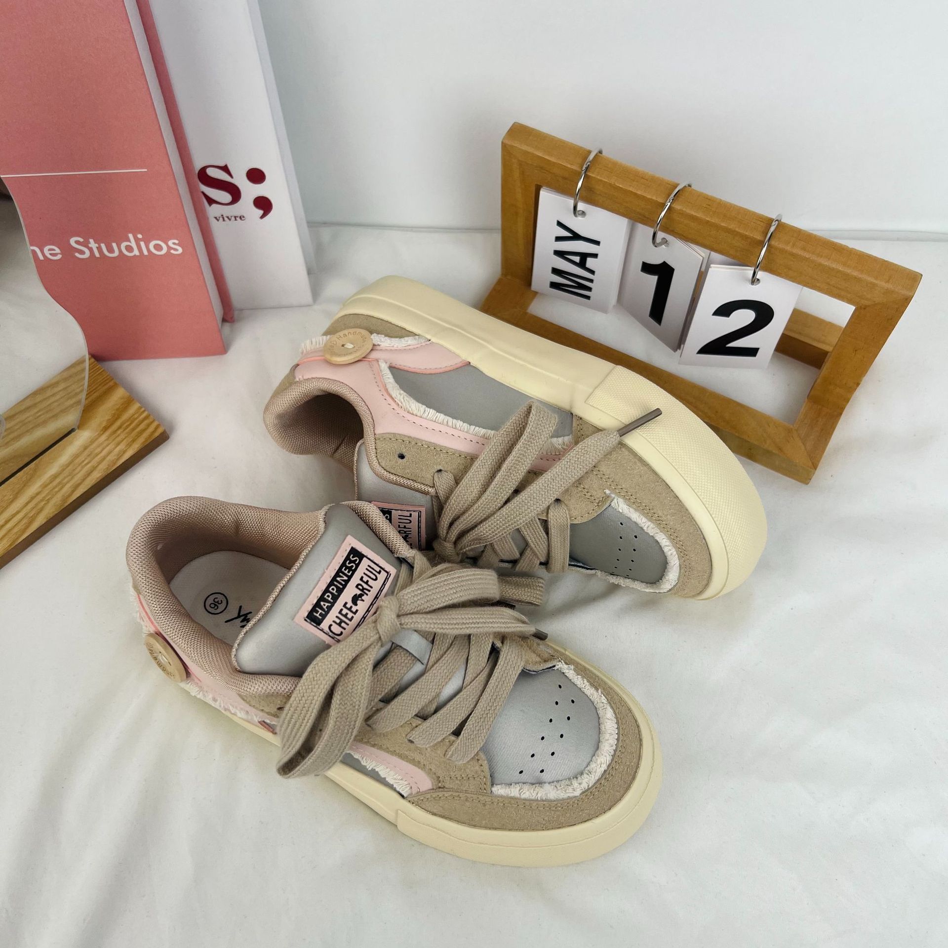 Zapatos de lona de borla versátil estilo coreano para mujeres 2024 primavera nuevo estudiante plano de moda estilo universitario japonés zapatos blancos para mujeres