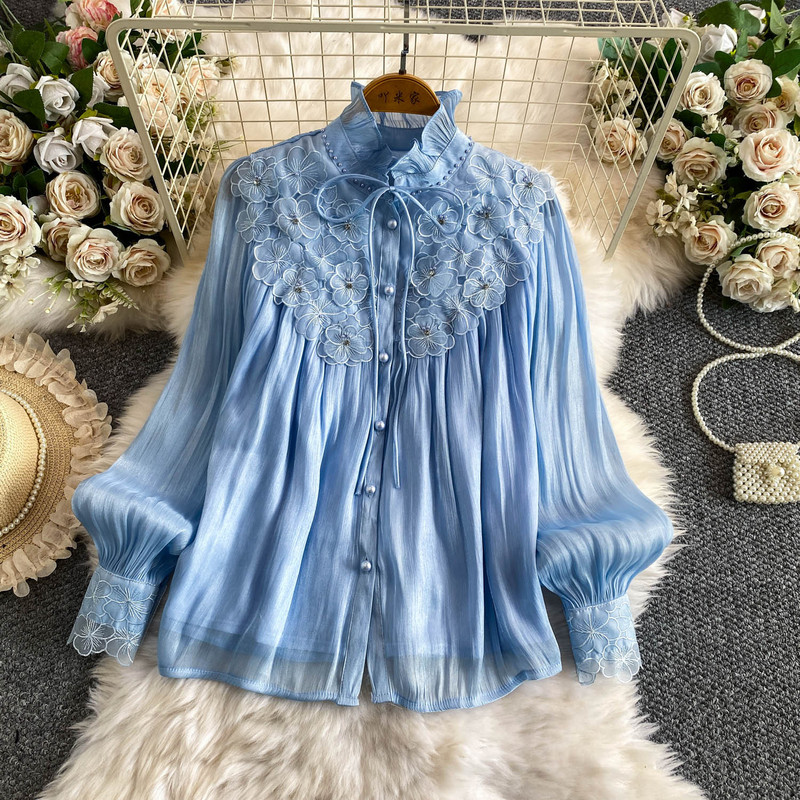 Light luxury and elegant style, heavily beaded with three-dimensional floral designs, featuring a ruffled collar, a women’s blouse with a youthful and chic look, made of shimmering chiffon fabric