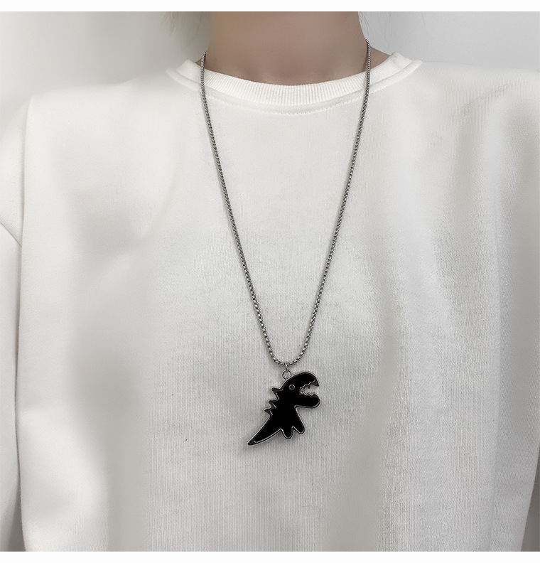 Creative and cute cartoon dinosaur titanium steel necklace with niche design, couple long sweater chain_voghion.com