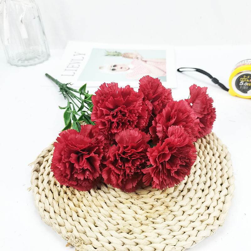 Xiaoyu Simulation Flower 7 Claveles Manlos de estilo europeo Ramo de claveles del día de la madre Paquete suave interior al por mayor