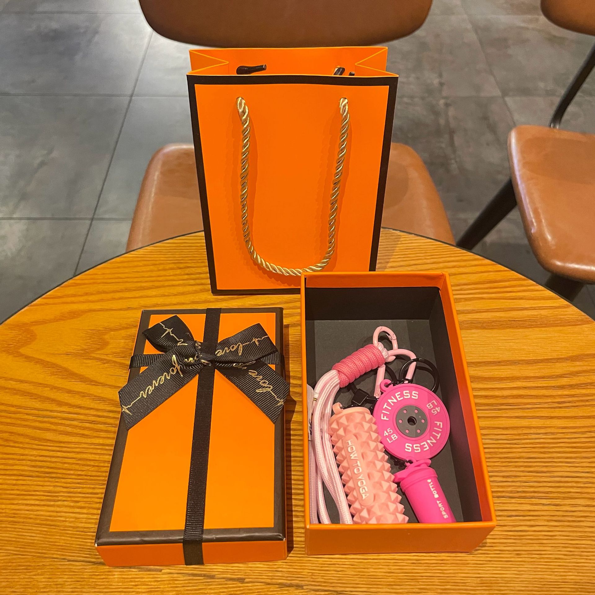 Fuchsia set for yoga from foam, orange gift box
