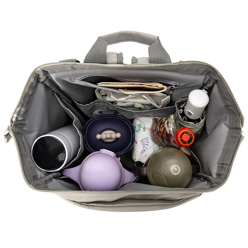 Nuevo bolso de mamá al aire libre multifuncional bolsa de biberón de aislamiento térmico, bolsa de mamá y bebé, mochila de cochecito colgante para mamá