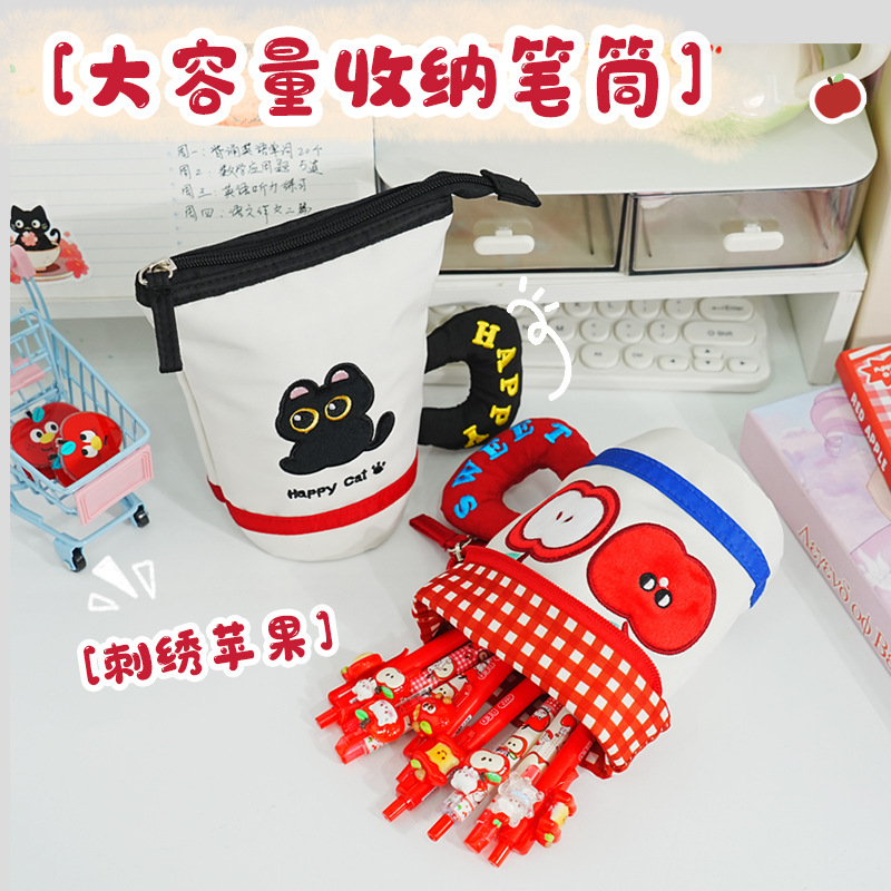 Nuevo pequeño libro rojo con el mismo lindo cilindro plegable cremallera bolsas de lápiz creativas de alto valor facial de gran capacidad bolsas de lápiz lindas