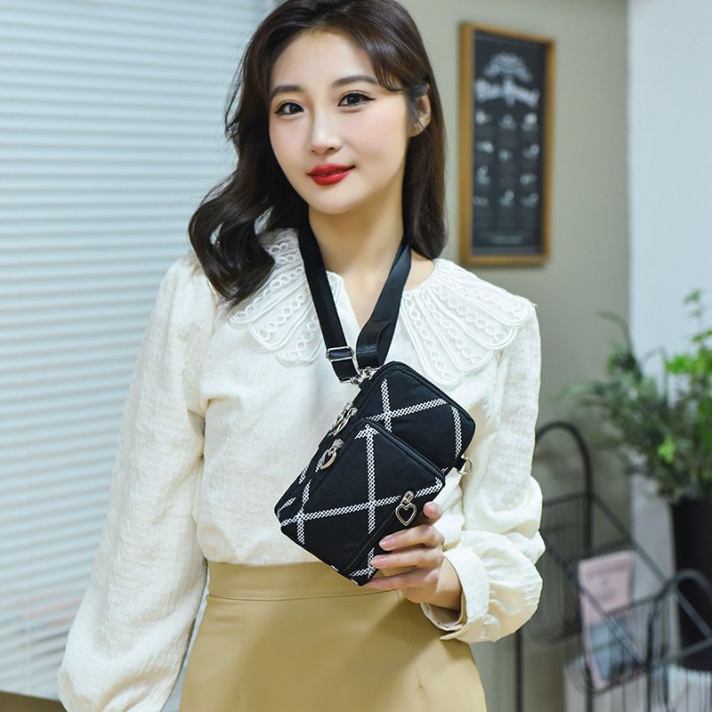 Venta al por mayor 2023 bolso de teléfono móvil crossbody mini bolso de verano bolso de teléfono móvil hombro Halter muñeca monedero