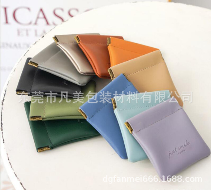 Fábrica al por mayor pieza de primavera pu auricular automático boca apretada bolsa de almacenamiento inalámbrico auricular cable de datos Portátil Bolsa de metralla