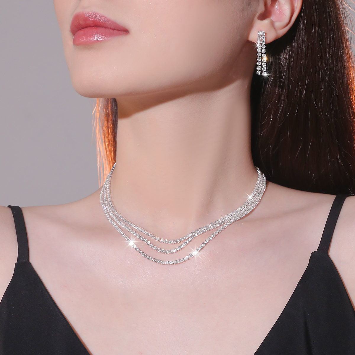 Europa y América transfronteriza Venta caliente diamante brillante collar pendientes de dos piezas de la boda del banquete vestido de accesorios traje de joyería de moda