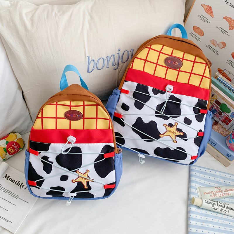 Nuevo patrón de tendencia jardín de infantes mochila para niños de clase pequeña, niños y niñas de 4 - 6 años de edad, mochila ligera para reducir la carga