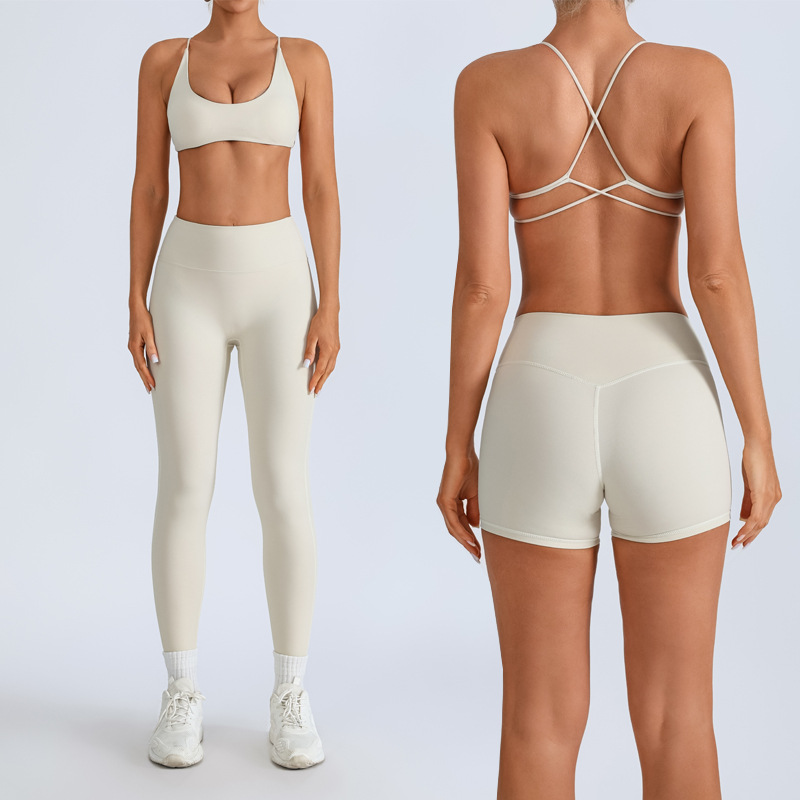 Traje de yoga europeo y americano transfronterizo, espalda hermosa con almohadilla para el pecho, sujetador con tirantes cruzados, pantalones deportivos de secado rápido de melocotón de cintura alta
