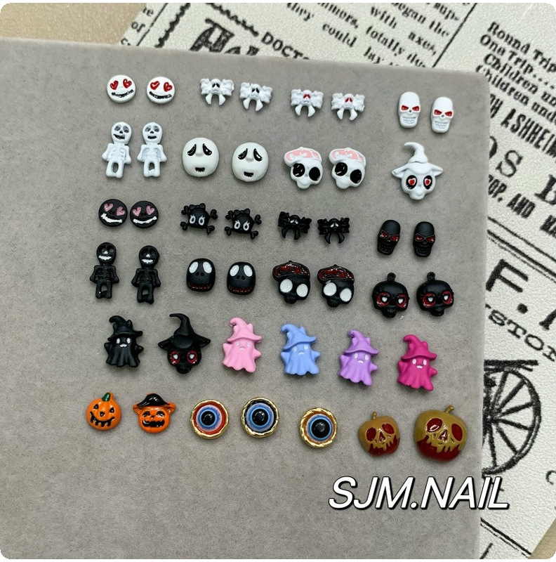 Cross-border Halloween nail art accessories: ghost, pumpkin, skull spray paint, simple black and white colorful nail decorations wholesale