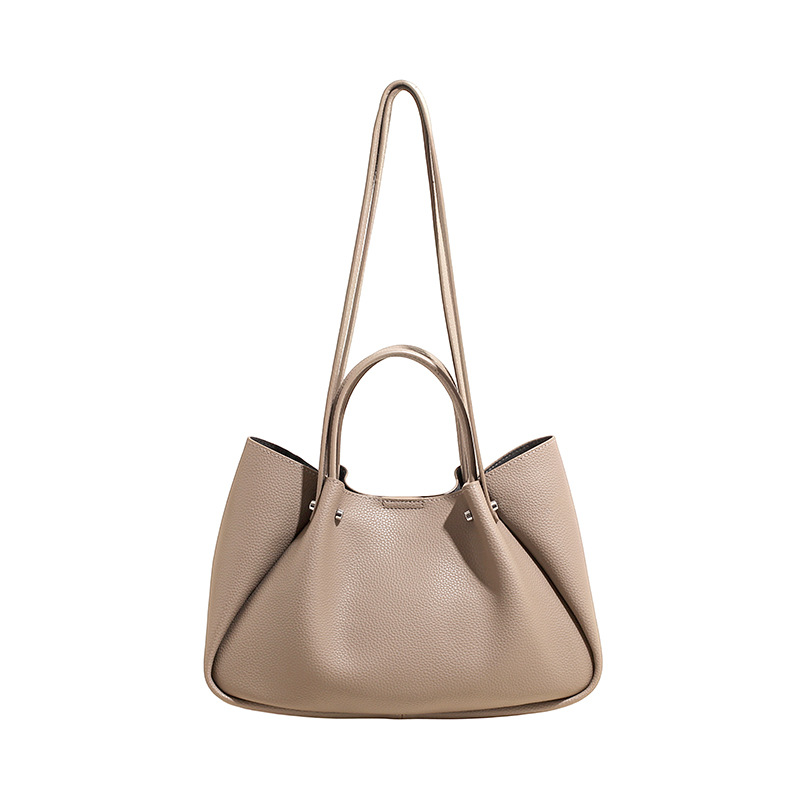 Bolso coreano nicho bolso de brazo bolso de mujer 2026 nueva gran capacidad de transporte universal bolso de hombro