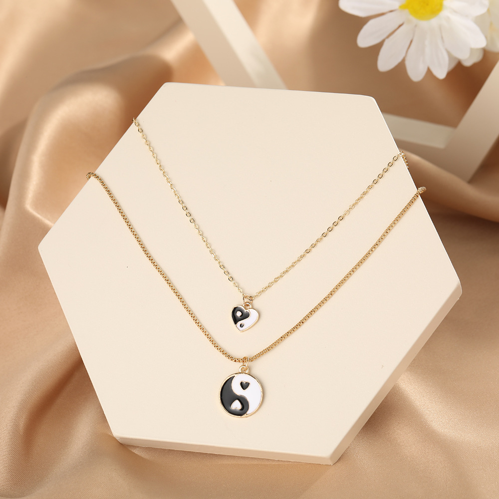Großhandel Kreative Einfache Tropfen Öl Tai Chi Herz Anhänger Doppel Halskette Nihaojewelry display picture 9