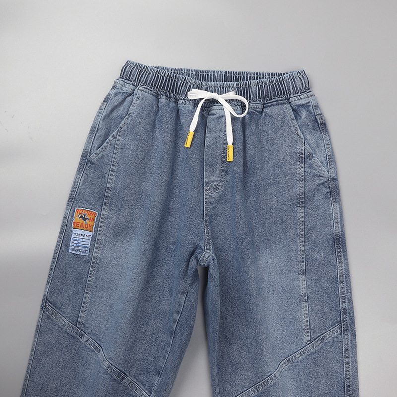Comercio exterior cortar la etiqueta ropa de hombre suelta pie abrazado siete puntos jeans cintura elástica cuerda de dibujo de verano juvenil ocio pantalones harun moda