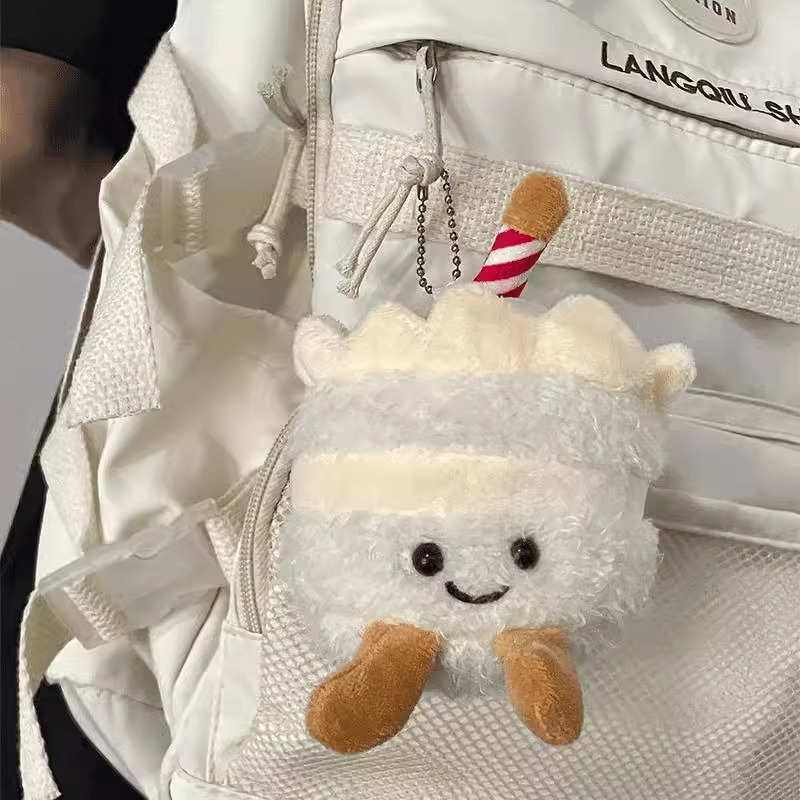 Pastel de peluche pequeño colgante lindo estudiante amiga bolsa de regalo extraña muñeca muñeca muñeca máquina de peluche lote