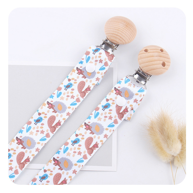 Nuevos productos para bebés creativos de cabeza redonda abrazadera de chupeta de beech desmontable larga cadena de chupeta de tela