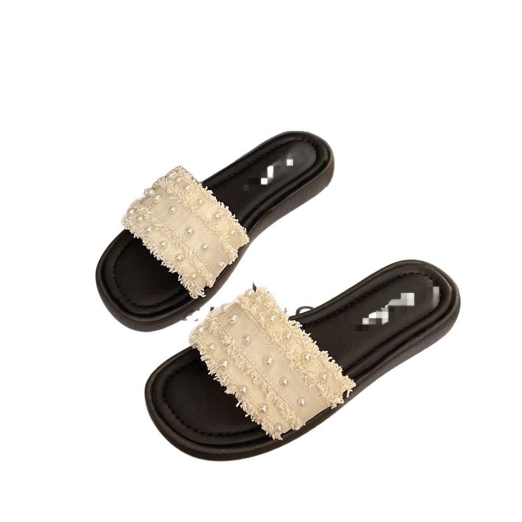 Zapatillas de perla con sandalias de falda 2026 verano nuevo tacones bajos casuales cómodas zapatillas de viento