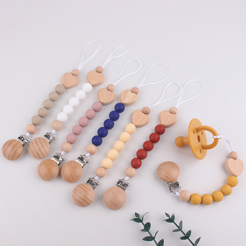 Clip de tetina de tres agujeros redondo de beech para calmar al bebé tetina de silicona de goma de diente anti-caída cadena