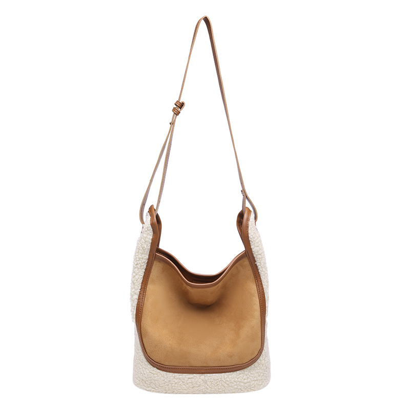 Retro tela esmerizada bolso de cubo de agua mujer 2025 nuevo nicho de moda cordero gran capacidad mochila de hombro