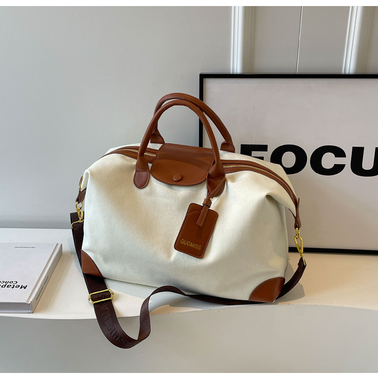 Bolso de lona informal de gran capacidad para mujer, nuevo modelo 2025, moderno, ligero, para viajes, bandolera, bolso de hombro