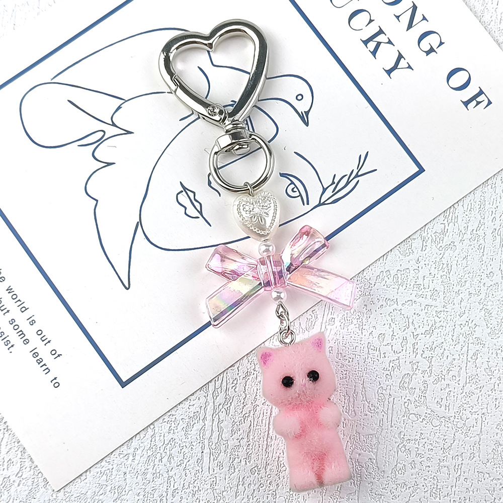 Transfronterizo japonés y coreano ins lindo flocado gatito estrella de cinco puntas garra de gato amor llavero lote colgante de mochila de cadena Guben