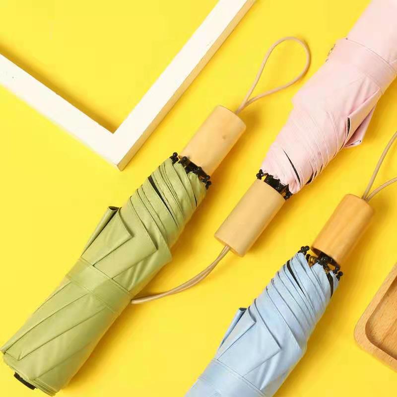 Sun umbrella sunny and rain dual-use umbrella sun protection UV protection sunshade small fresh solid wood handle folding umbrella advertising umbrella Sun umbrella sunny and rain dual-use umbrella sun protection UV protection sunshade small fresh solid wood handle folding umbrella advertising umbrella