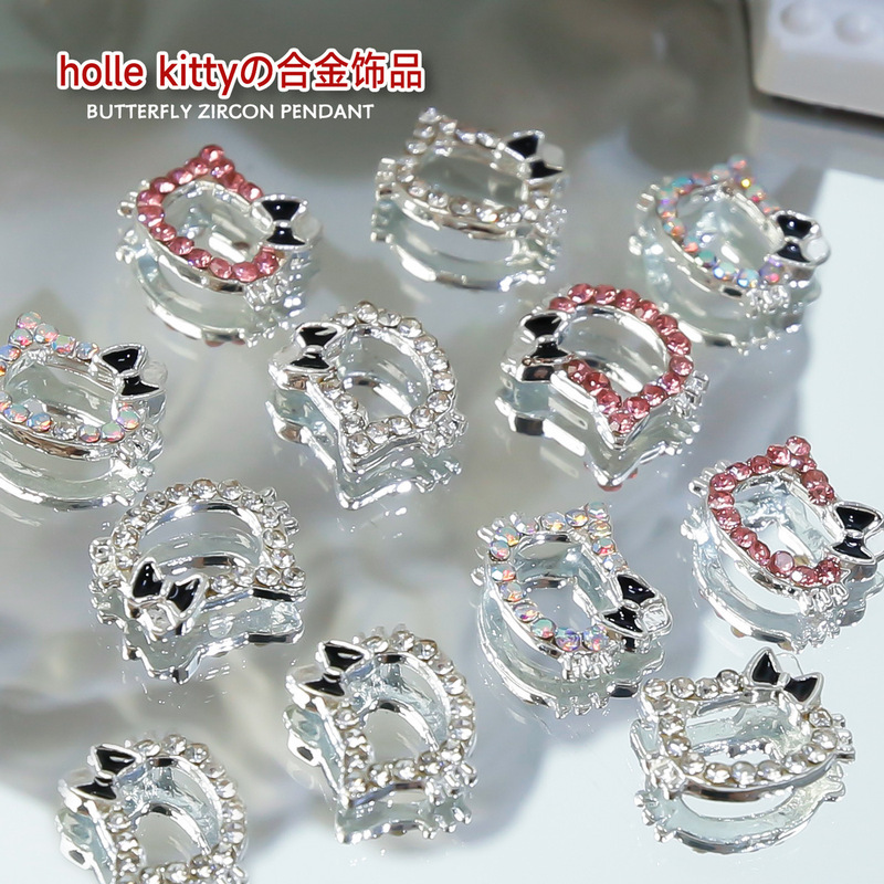 New Hello Kitty alloy nail jewelry hollow KT kitten diamond bow nail decoration accessories wholesale New Hello Kitty alloy nail jewelry hollow KT kitten diamond bow nail decoration accessories wholesale