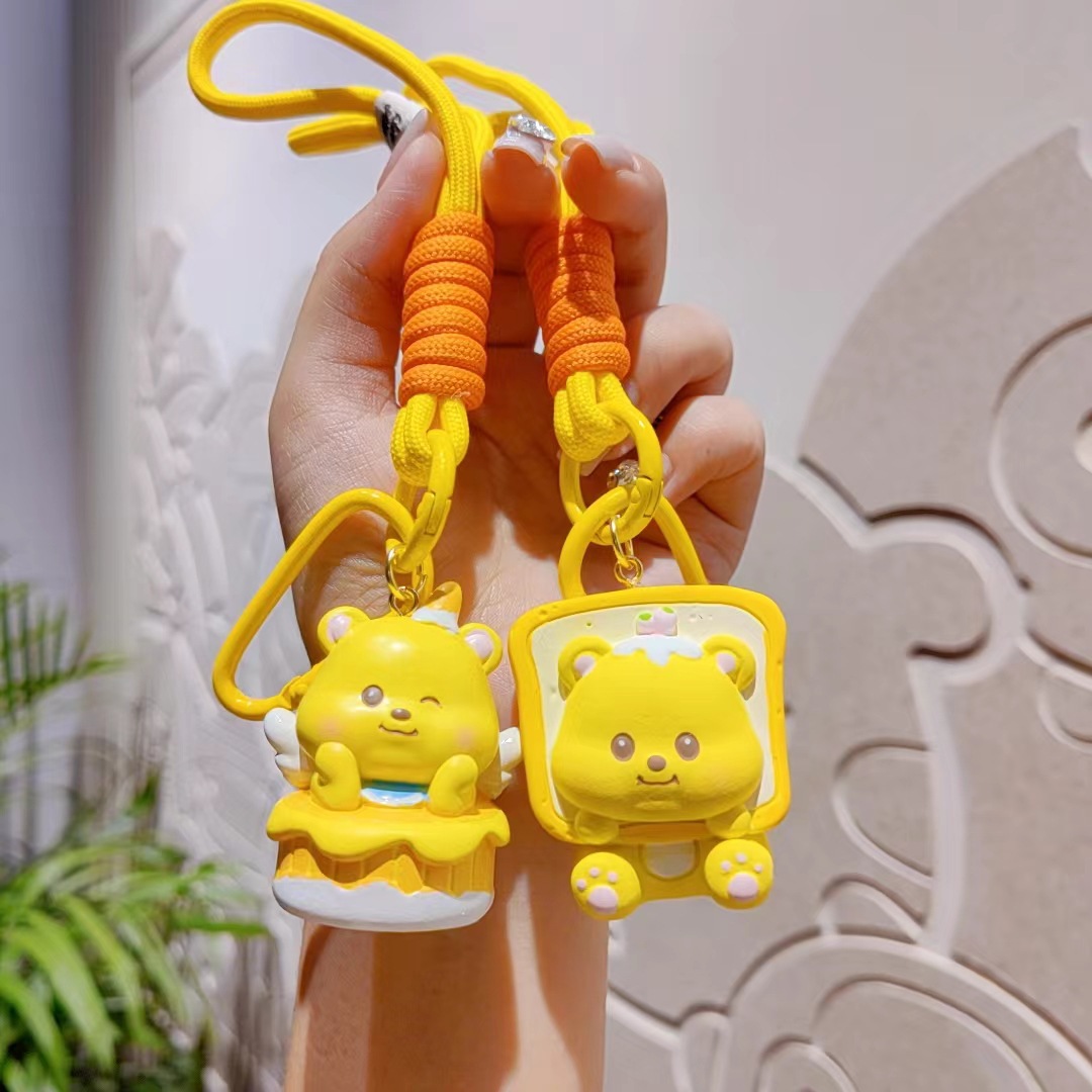 Creativo caricatura crema osos llaveros pareja llaveros llaves de automóvil colgantes bolsos de chicas colgantes regalos