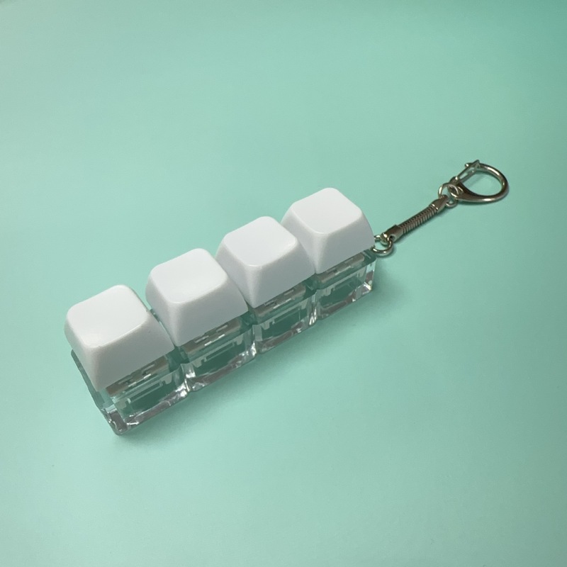 クロスボーダー一字型四ボタンは純色のボタンを押して軸を解凍します。|undefined
