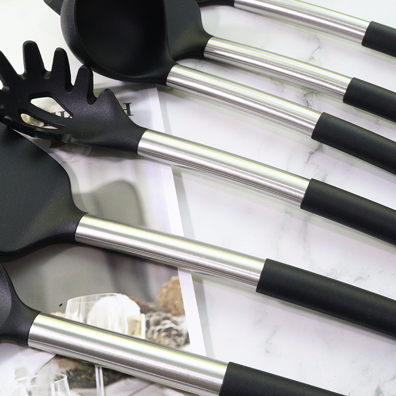 Cuchara de sopa de espátula de silicona transfronteriza 15 piezas de acero inoxidable espátula de silicona sartén antiadherente traje de cocina de silicona al por mayor