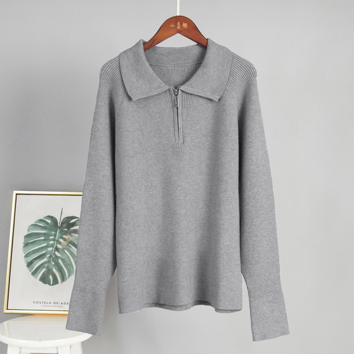 Transfronterizos Europa y Estados Unidos otoño y invierno 2025 nueva tendencia versátil simple ocio polo collar con solapa suéter de punto