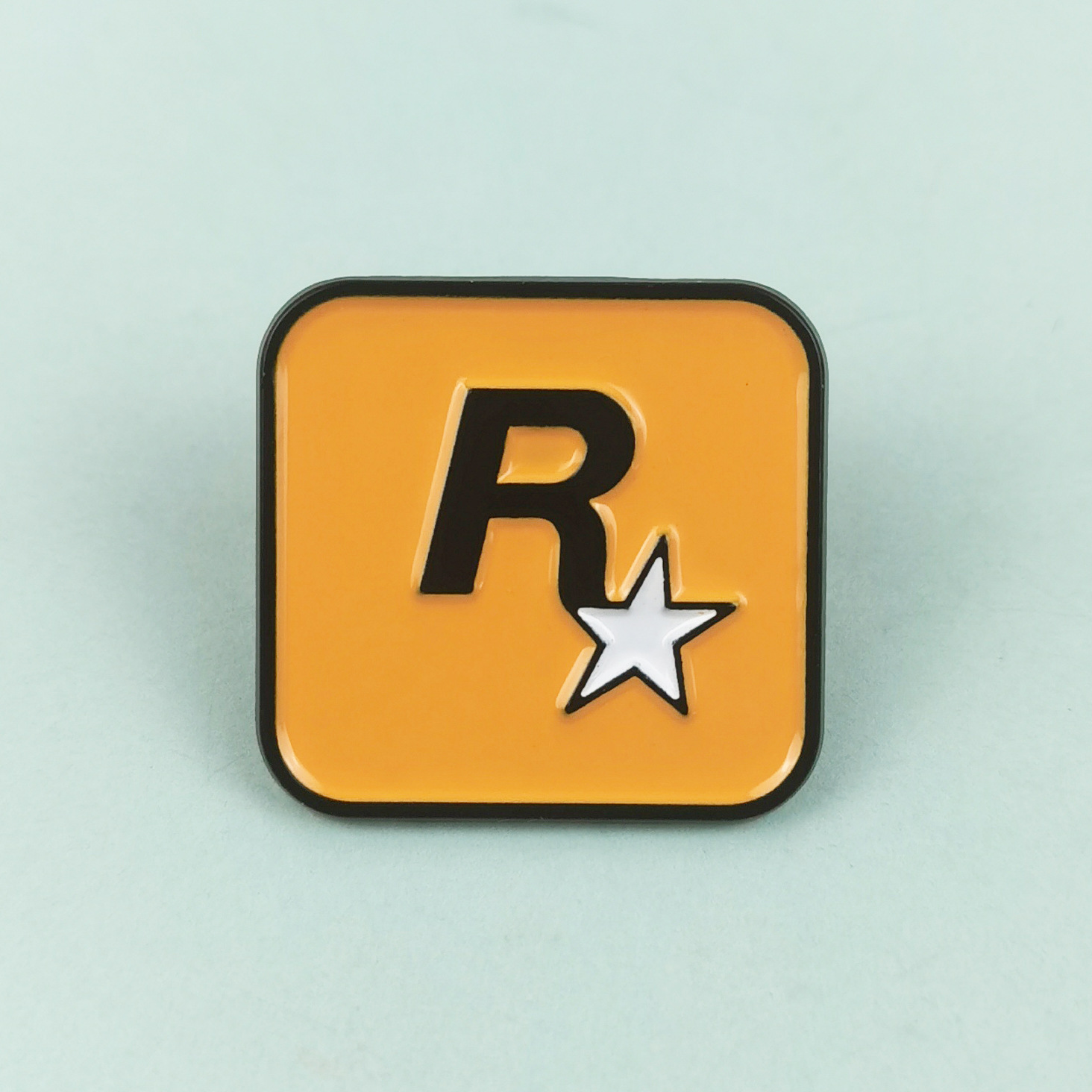 Juego de carreras logo broche periférico ins personalidad R estrella geométrica accesorios mochila para niños decoración hebilla de alfiler