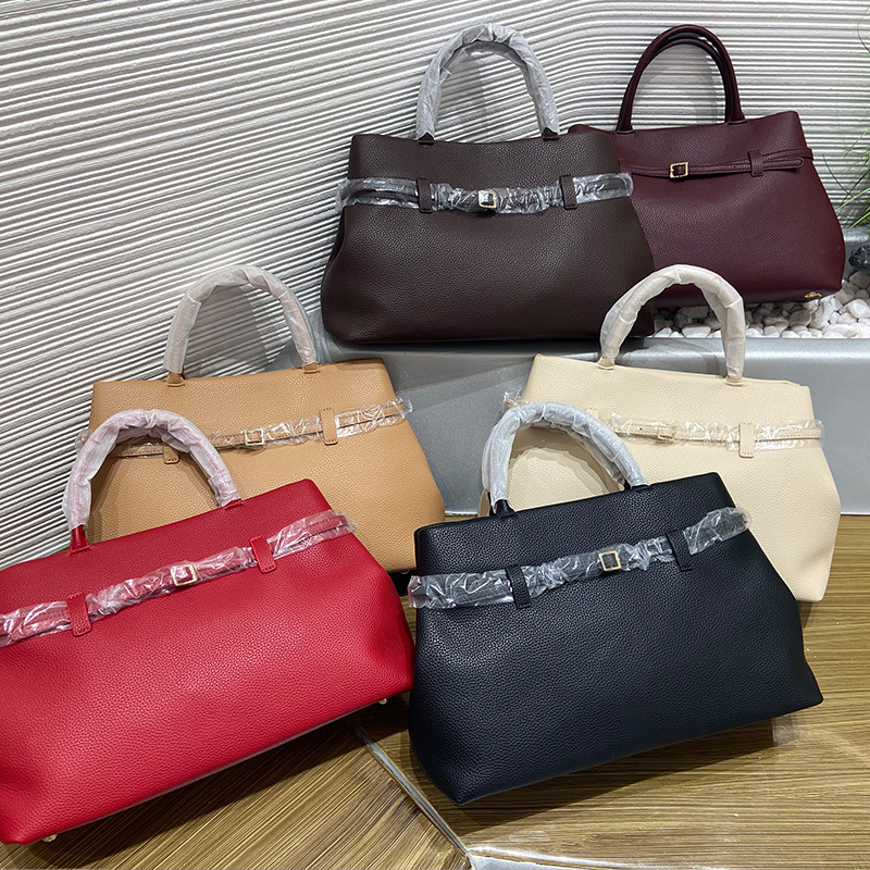 Small Crowdbag High-end Soft Leather Lychee Pattern Solid Color High-end Belt Buckle Portable Crossbody Bag Small Tote Commuter