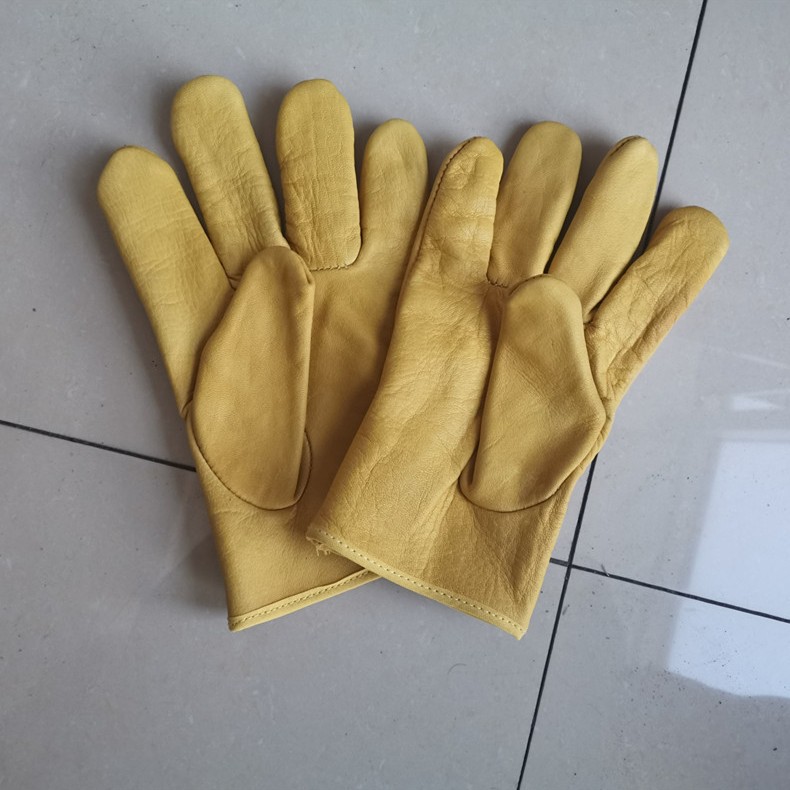 Guantes cortos de cuero protectores al por mayor para conductores, hechos de cuero vacuno integral, resistentes al desgaste, para soldadores, suministros de protección laboral, fabricante, engrosados. image 3