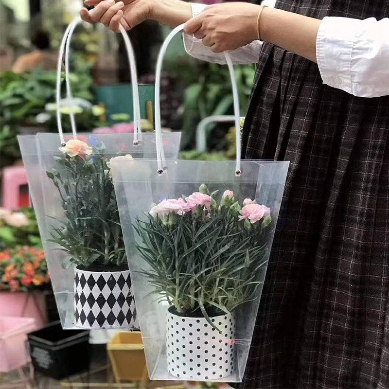 Yiwu fábrica en stock al por mayor material de embalaje de flores suculentas en maceta Bolso de Plástico de regalo bolsa de ramo de flores