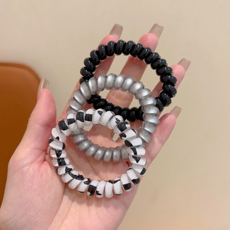Anillo de cabello coreano de ondas para niños línea telefónica de alta elasticidad simple 2024 nueva banda de goma de cabello para niñas no lastimas