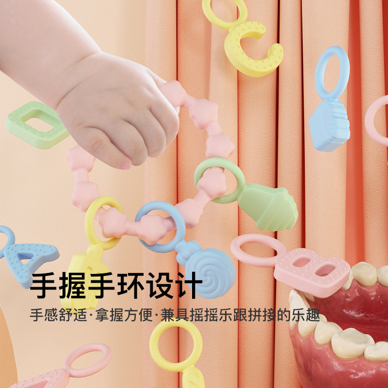 Baby silicone bracelet teether baby anti-eating hand bite gum oral chewing toy pacifier molar stick