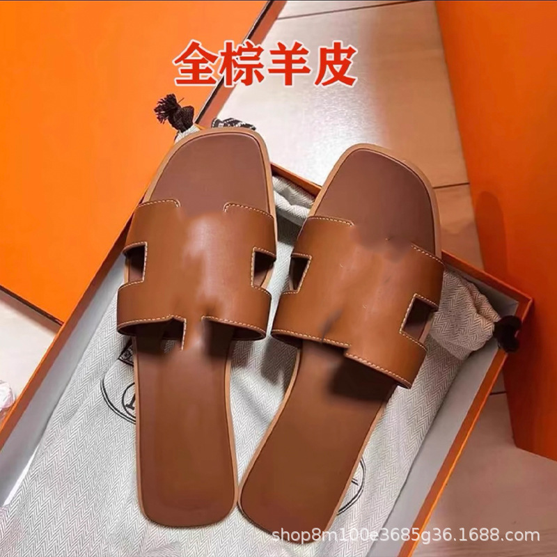 鼎羊皮の新型真皮平底ネット赤同タイプのスリッパ女性夏外着一字引きビーチカジュアル太さと涼しさ引き