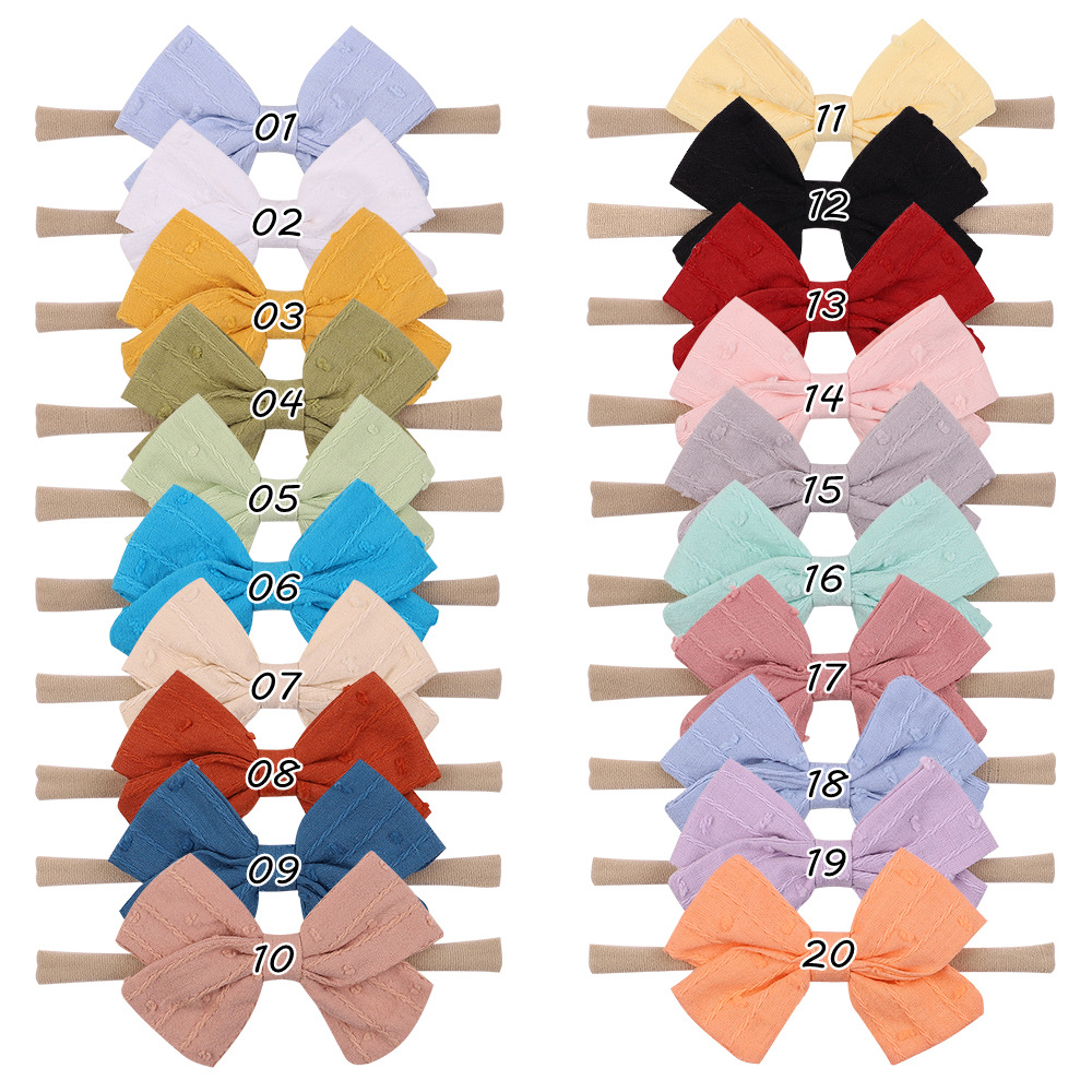 Europäische Und Amerikanische Kinder Bowknot Haarband Baby Baby Super Weiche Nylon Stirnband Süßigkeiten Farbe Haarschmuck Großhandel display picture 1