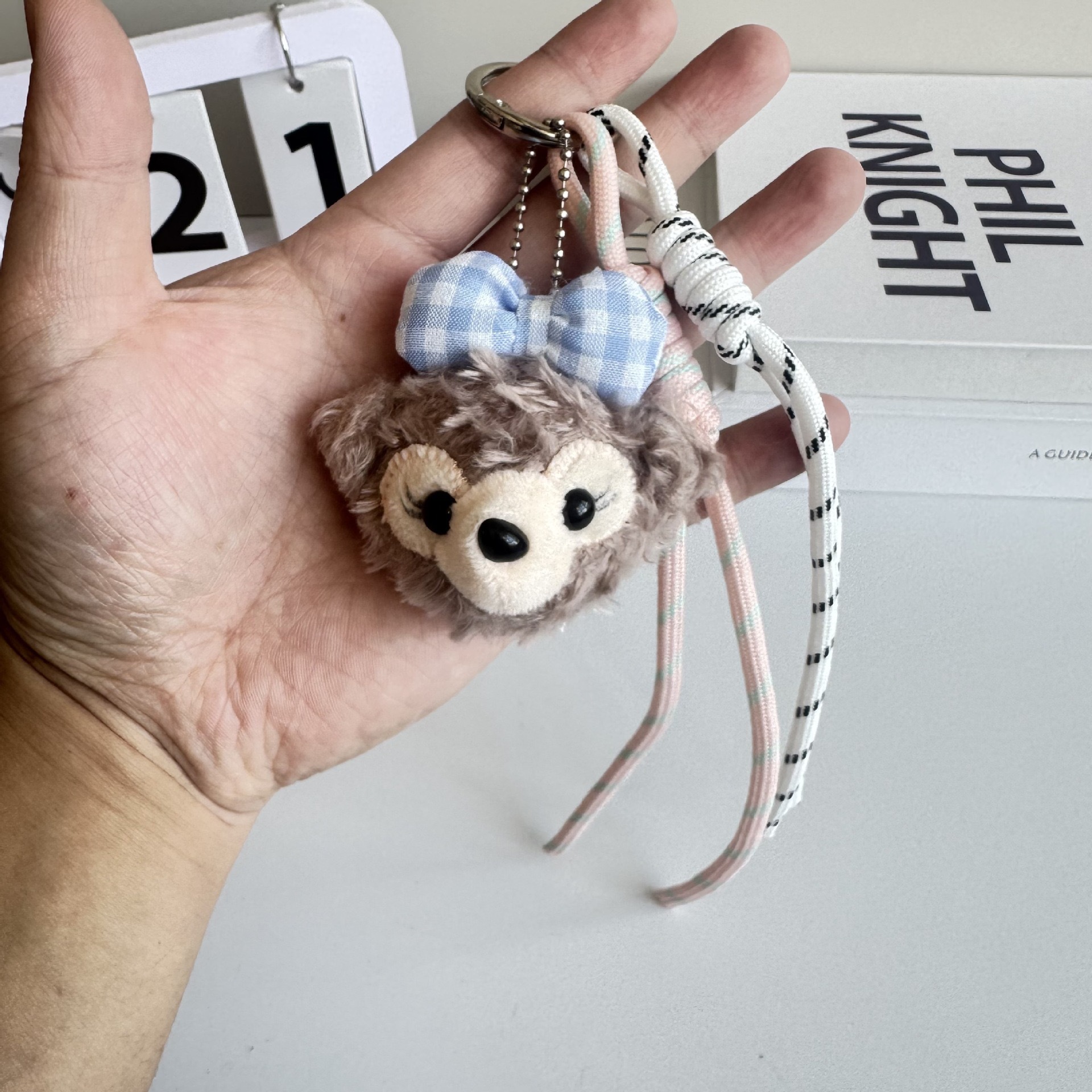 Adorable muñeca de peluche colgante llavero de dibujos animados Bell tejido colgante de cuerda decoración arco colgante de bolsas