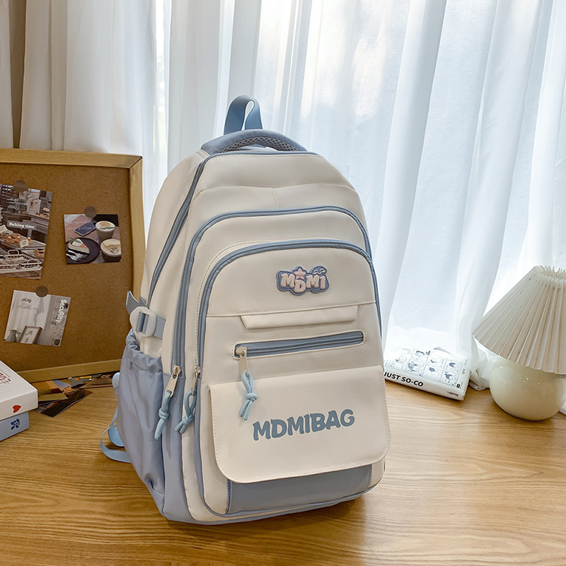 Mochilas escolares niñas de secundaria de alto valor facial nicho estilo insfeng estudiantes de secundaria de gran capacidad chocan con el color de los estudiantes de primaria para reducir la carga mochila