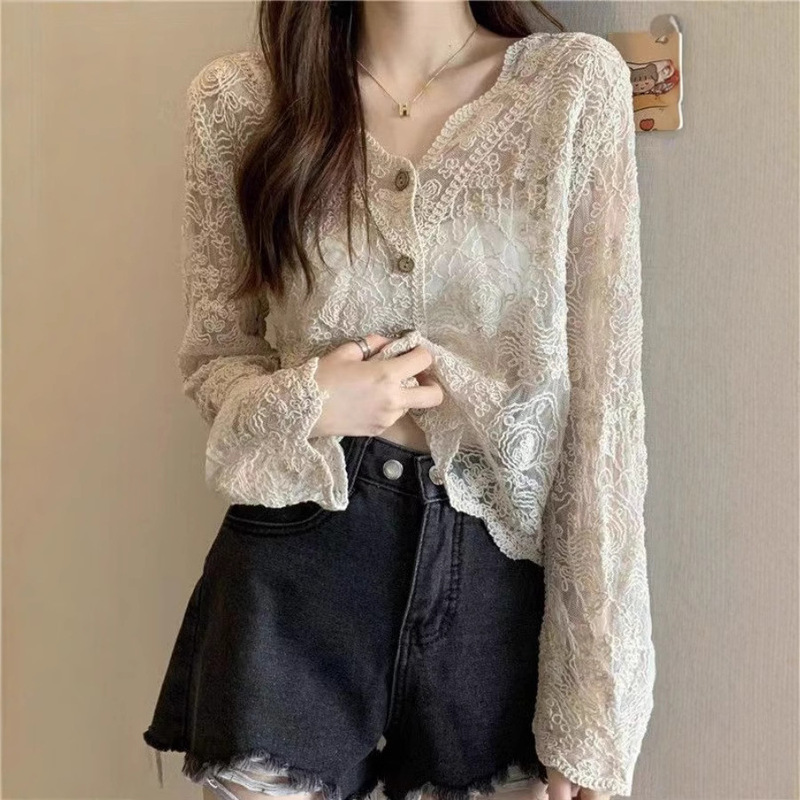 レースの透かし彫りの日焼け止めの服のニットのカーディガンの薄いタイプの女性のサスペンダーのスカートの外で上着の夏のゆったりしている韓国版のコートを掛けます。|undefined