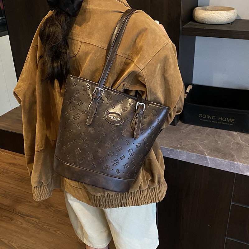 Cross-border 2025 otoño y invierno nuevo retro leopardo bolso de brazo de moda de viaje bolso de cubo de mujer moda coreana bolso de hombro