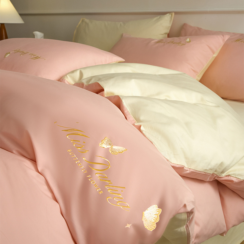 Estilo de lujo ligero 40 piezas de algodón puro traje de cuatro piezas corazón de niña bordado floral funda de edredón ropa de cama de algodón suave de alta calidad