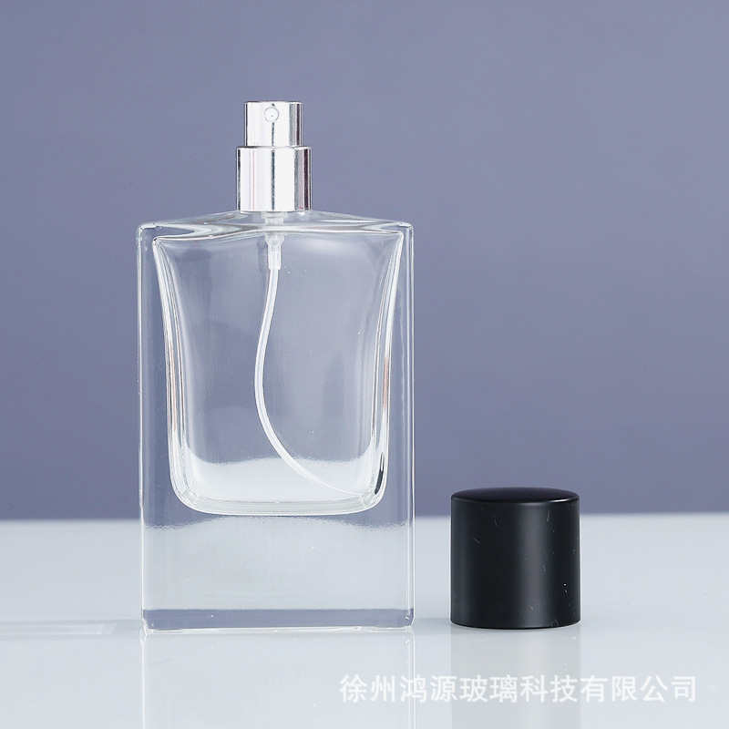 Botella de spray de vidrio 50ml de material blanco de cristal de alta carga Botella de dispensación de spray de perfume de vidrio Botella cuadrada plana de fondo grueso transparente
