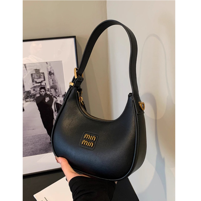 Bolso pequeño para mujer 2025 nueva bolsa de media luna bolsa de bola de masa de otoño e invierno bolso de mensajero negro de viaje bolso de la axila de mano