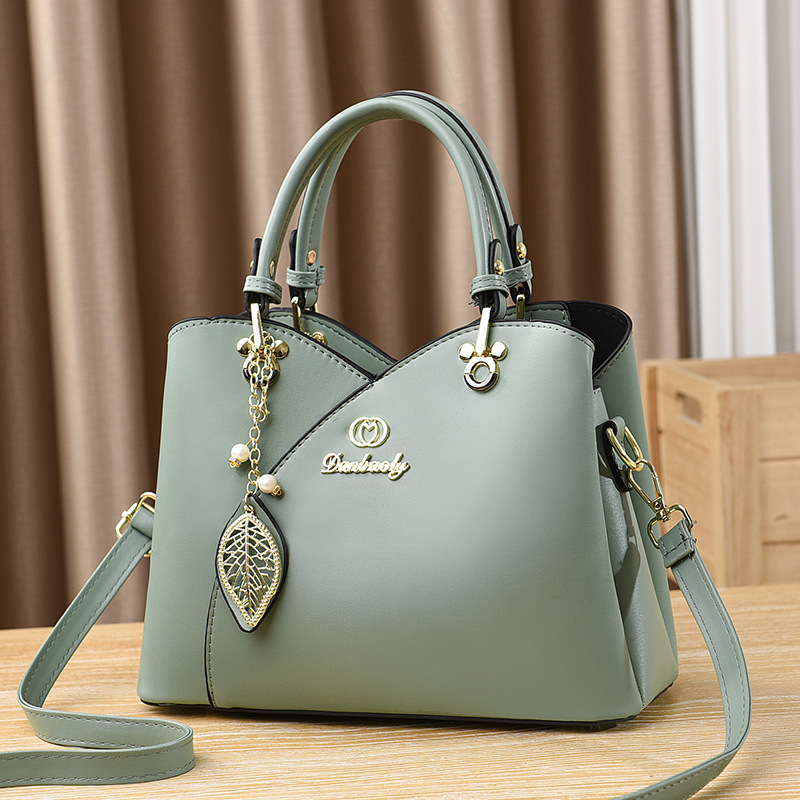 Bolso bandolera para mujer nuevo versátil bolso de mamá moda de verano bolso de mano de un solo hombro 2025 fabricante comercio exterior elegante para mujer.